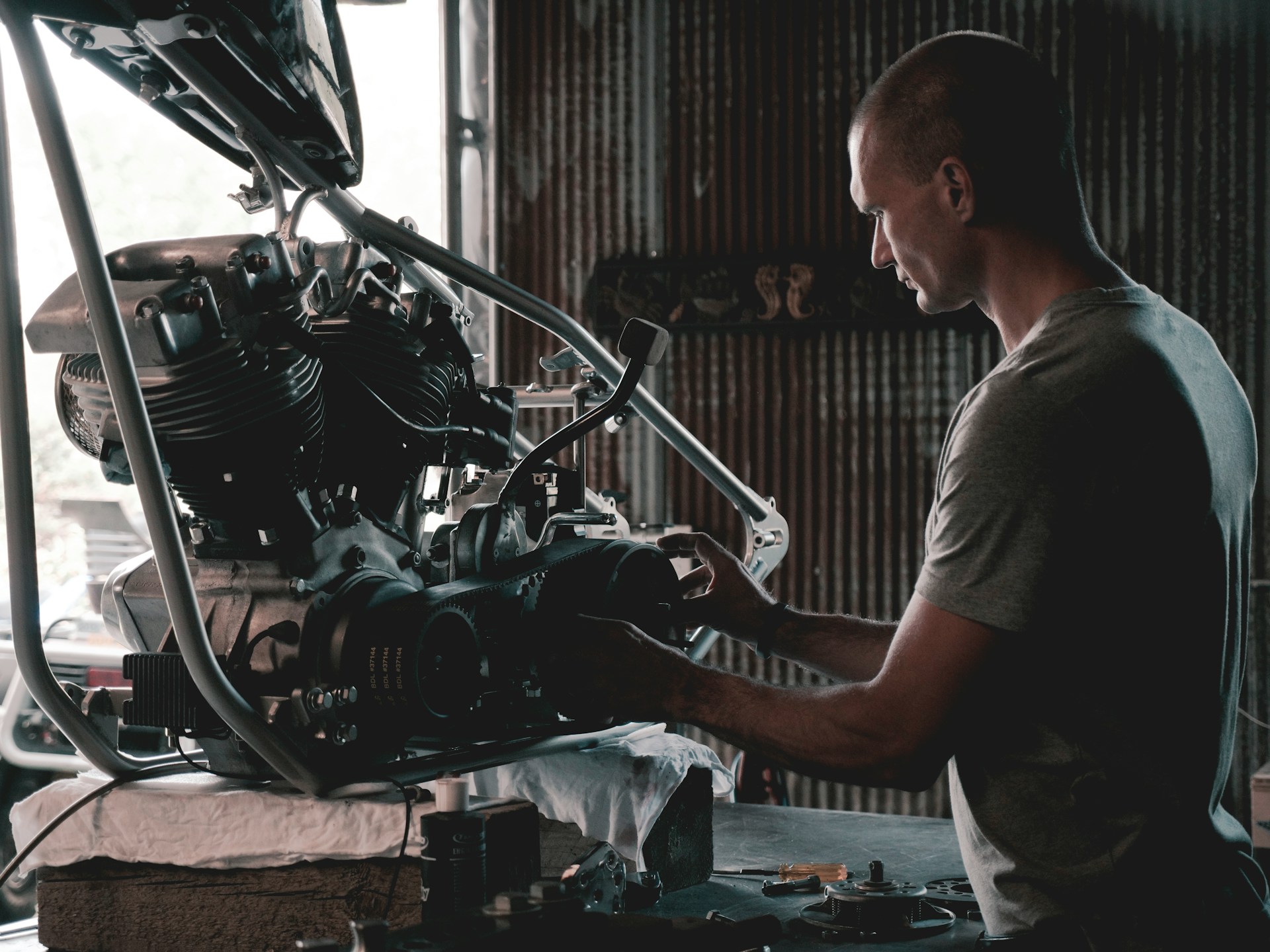 aaron-huber-KxeFuXta4SE-unsplash Man holding engines